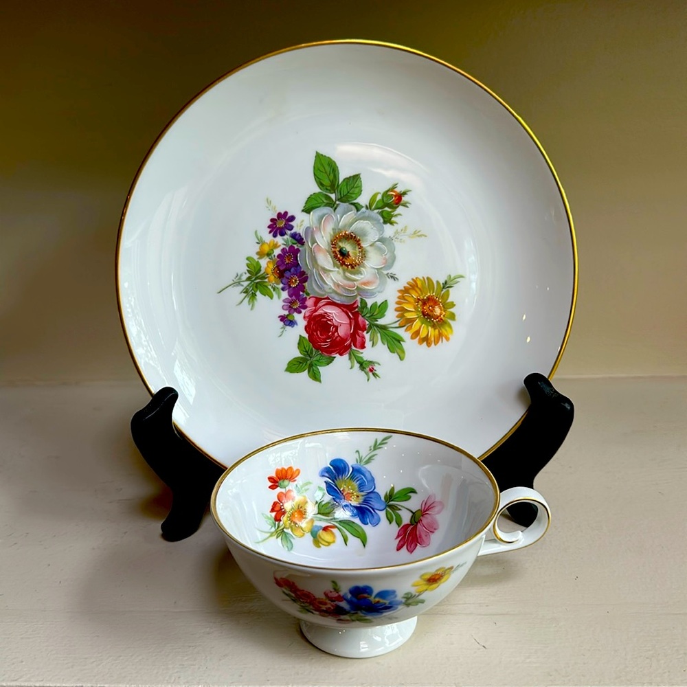 White and Blue Dinnerware Set with Elegant Floral Design